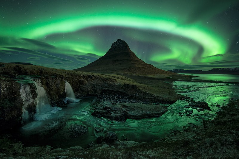 Aurora over Kirkjufell in Iceland by David Clapp