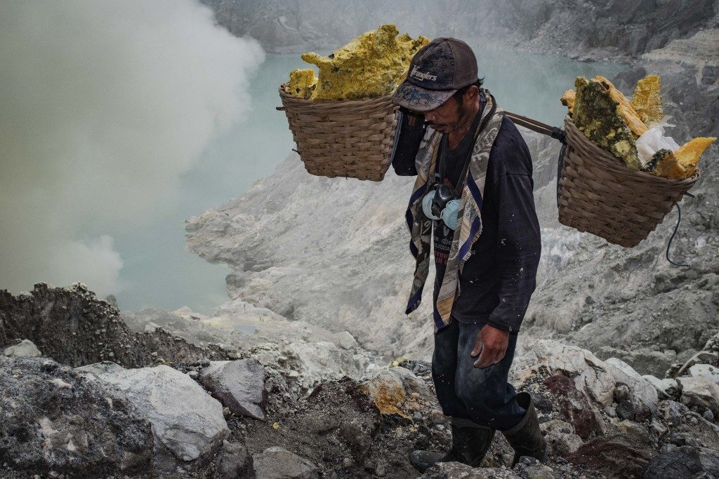 Sulfur Miner - Mt Ijen LQ by Sebastian Jacobitz